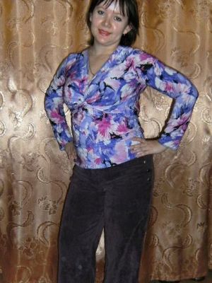 Bluse med drapering foran i mønstret stof